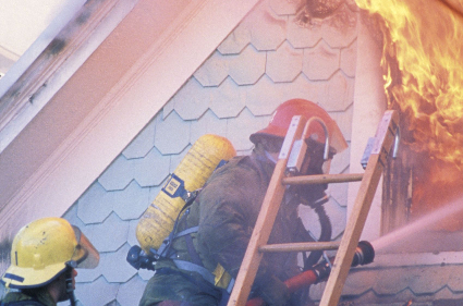 Firefighters fighting a house fire